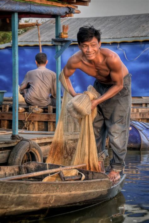 Fisherman on the Tonlé Sap Tonle sap Cambodian people Cambodia