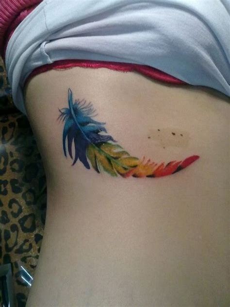 Lovely Colorful Feather Tattoo On Rib Side Tattooimages Biz