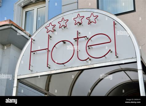 'Hotel' sign above a hotel entrance Stock Photo - Alamy