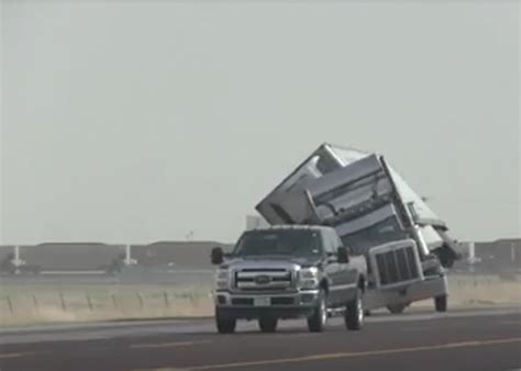 Storm Chaser captures semi truck being manhandled by strong winds