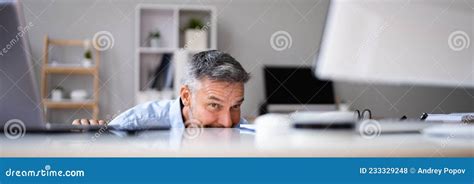 Sneaky Mature Man Avoiding Work Stock Photo Image Of Office Male