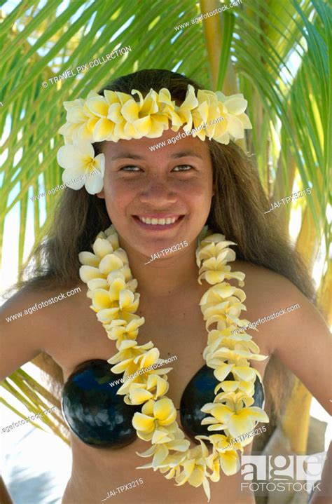 Polynesian Girl Dressed In Traditional Costume With Leis Flower