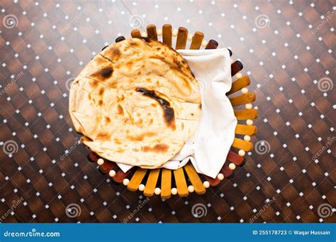 Laccha Paratha Or Tandoori Roti Served In A Basket Isolated On Table