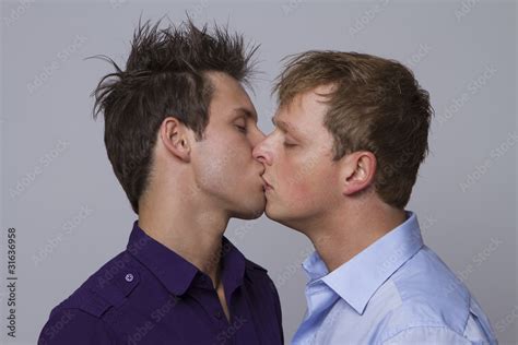 Two guys kissing Stock Photo | Adobe Stock