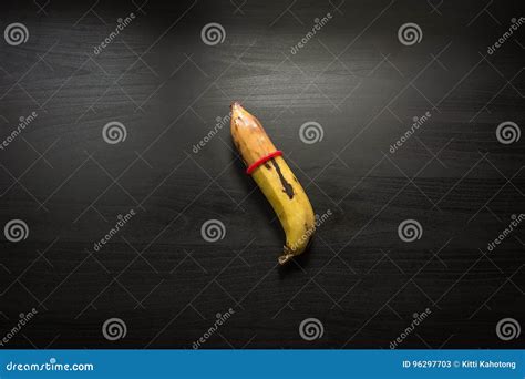 Banana And Condom On Black Wood Background Stock Image Image Of