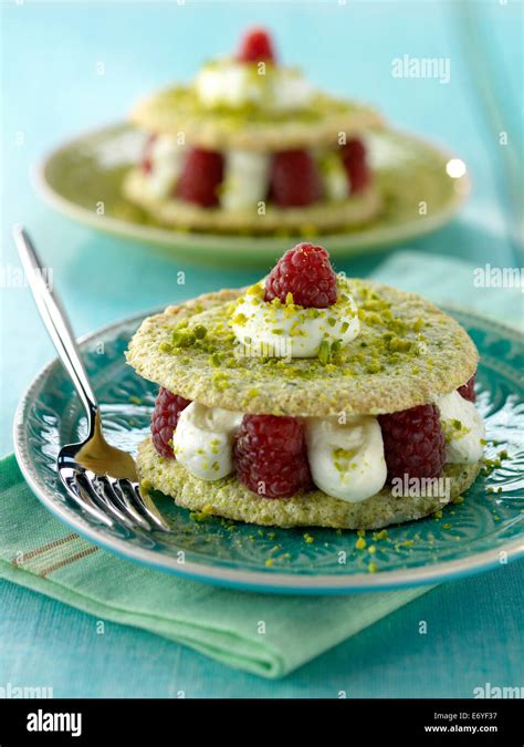 Pistachio And Raspberry Dacquoise Stock Photo Alamy