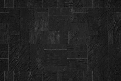 Premium Photo | Rough black marble tiles texture background