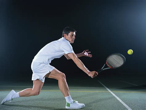 Man Playing Tennis On Outdoor Court By Bob Thomas