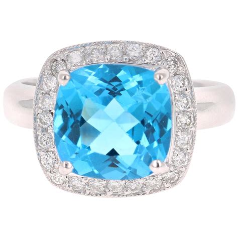 Diamond Town 829 Carat Emerald Cut Vivid Blue Topaz Ring In 14 Karat White Gold For Sale At