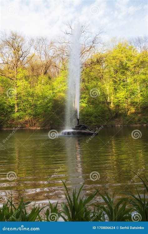 Beautiful View Of The Pond With The Fountain Snake In The National