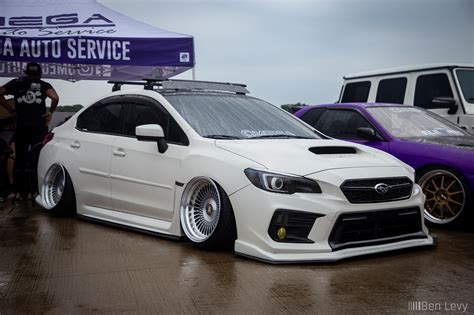 White Subaru WRX With Omega Auto Service BenLevy