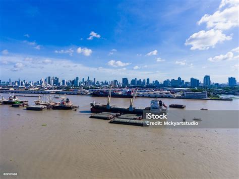 Top View Cargo Ship On Chao Phraya River And City Scape Stock Photo