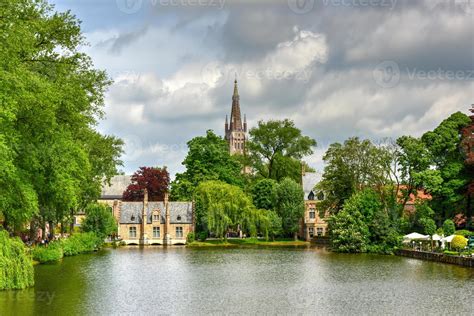 Minnewaterpark And Minnewater Lake In The Old City Of Bruges Belgium