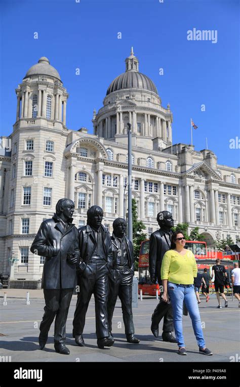 The New Beatles Statue On The Renovated Pier Head On The Waterfront In