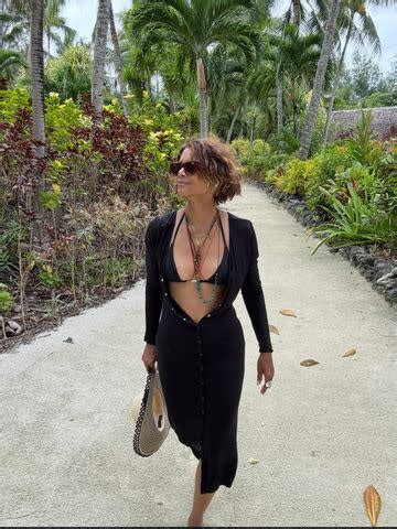 Halle Berry Stuns In A Plunging Unbuttoned Dress Over Tiny Bikini During Romantic Getaway AOL