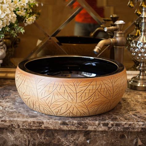 China Artistic Handmade Ceramic Wash Basin Lavobo Round Counter Top