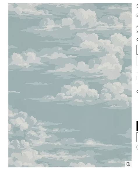 The Sky Is Filled With White Clouds On A Blue Background