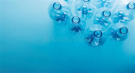 Empty Plastic Bottles On A Blue Background Recycling Recyclable