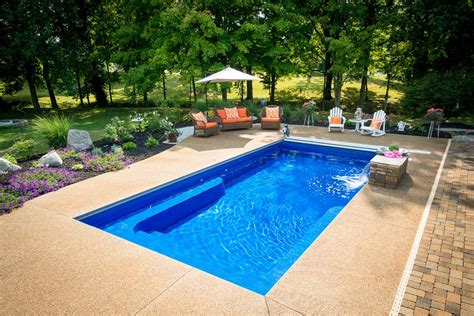 Bright Orange Cushions Make The Color Pops And The Patio Inviting Dare