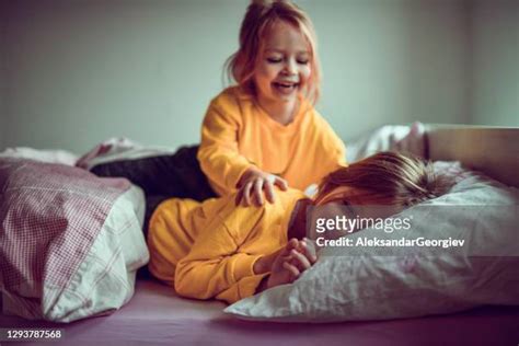 Sisters Sleeping Together Photos And Premium High Res Pictures Getty Images