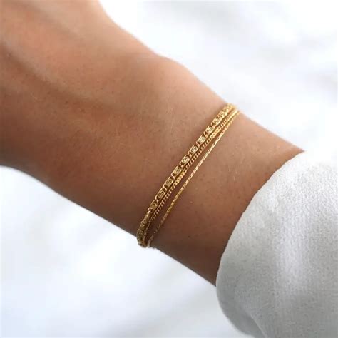 Bracelet doré triple rang chaine fine Victoire collection les