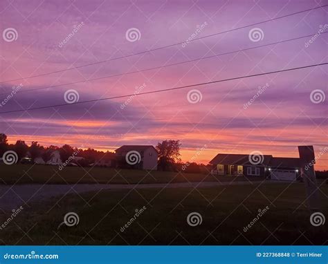 Sunset Behind Houses Stock Photo Image Of Dusk Cloud 227368848