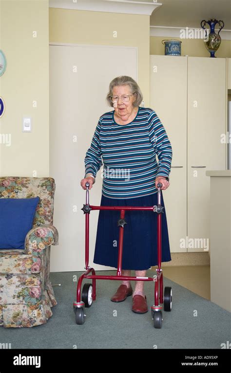 Old Lady Walking Zimmer Frame Hi Res Stock Photography And Images Alamy