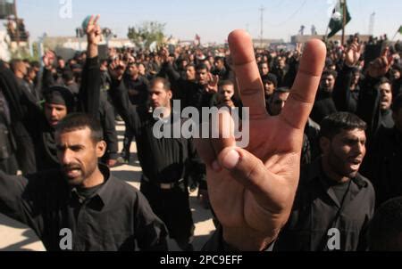 Members Of The Mahdi Army Followers Of Radical Shiite Cleric Muqtada