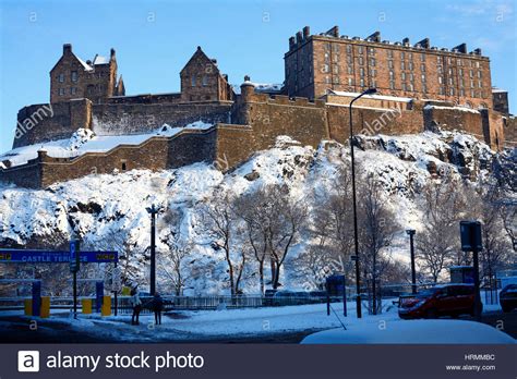 Edinburgh Castle in winter snow Stock Photo - Alamy