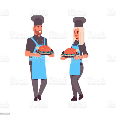 Cooks Couple Professional Chefs Holding Trays With Roasted Chicken Man