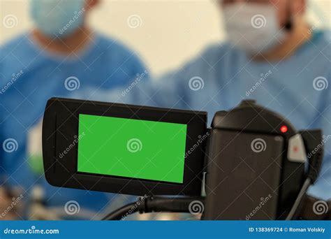 Video Recording And Live Broadcast Of The Work Of Two Surgeons