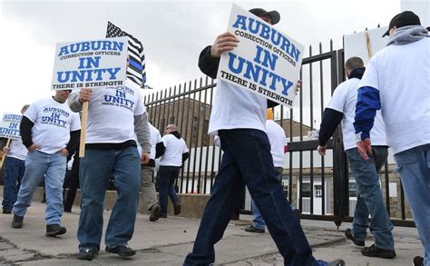 'Auburn In Unity': Corrections officers picket outside Auburn prison ...