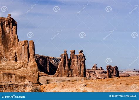 Three Sisters Rock Formation in Arches National Park Under the Sunlight ...