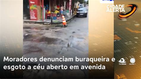 Moradores denunciam buraqueira e esgoto a céu aberto em avenida do