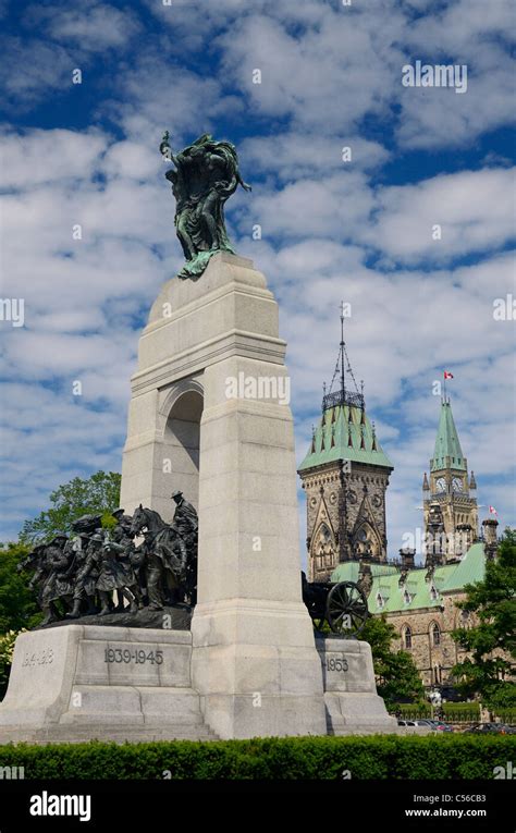 National War Memorial In Confederation Square In Ottawa With Parliament