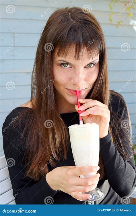 Beautiful Girl Drinking A Milkshake With A Straw Stock Image Image Of