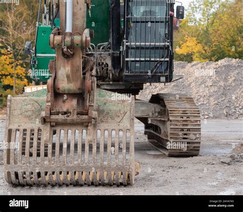 Building demolition with a demolition excavator on a building site Stock Photo - Alamy