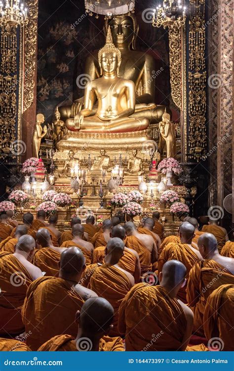 Buddhist Monks Pray To Buddha Inside Wat Bowonniwet Vihara Bangkok