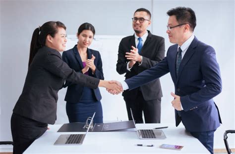 business woman shaking hands glasses stock  pictures