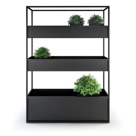 Three Black Shelves With Plants In Them On Top Of Each Other And One