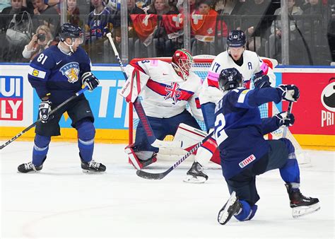 IIHF Finns Thrash British For First Win