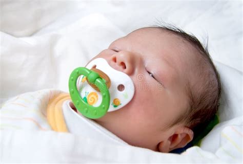 Newborn Baby With Pacifier Sleeping Stock Photo Image 33414862