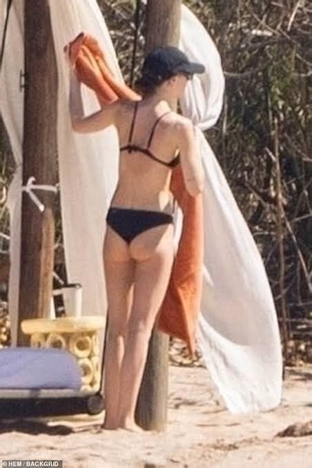 Dakota Johnson Shows Off Her Figure In A Black Bikini As She Joins