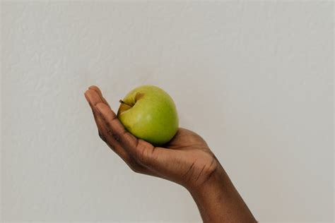 Red Apple With Two Green Apples · Free Stock Photo