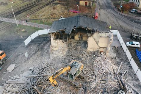 Yellow Excavator Destroys Building Heavy Duty Machine Is Demolishing A