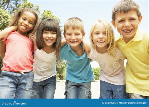 Group of Smiling Children Relaxing in Park Stock Image - Image of race, length: 55890085