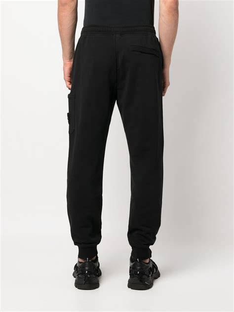 Stone Island Compass Patch Track Pants In Black Modesens