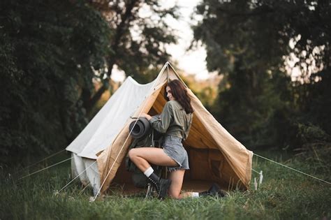 Premium Photo Camping With Tents Sexy Young Girl Travels With A Backpack The Girl On The