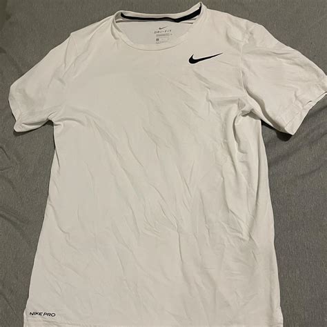 Small white Nike T-shirt #nike #depop #white #tshirt... - Depop