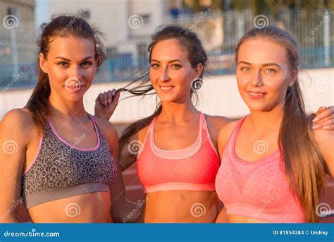 Portrait Of Group Women Friends Standing Together And Smiling Stock